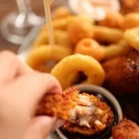 Fried Chicke Wing in Hand