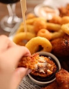 Fried Chicke Wing in Hand